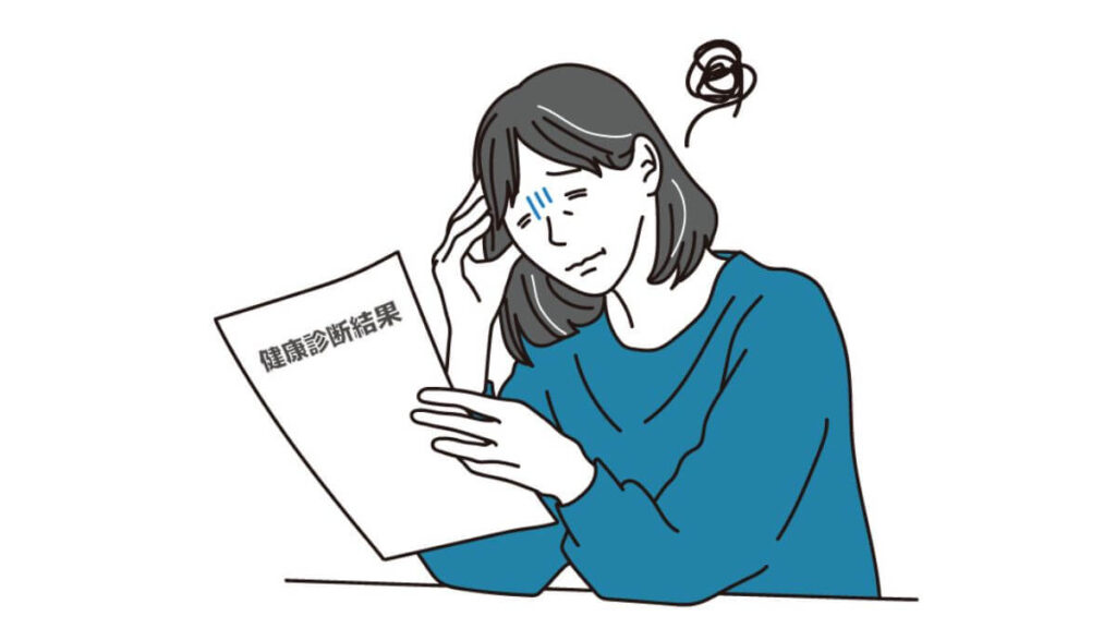 健康診断の結果を見て落ち込む女性