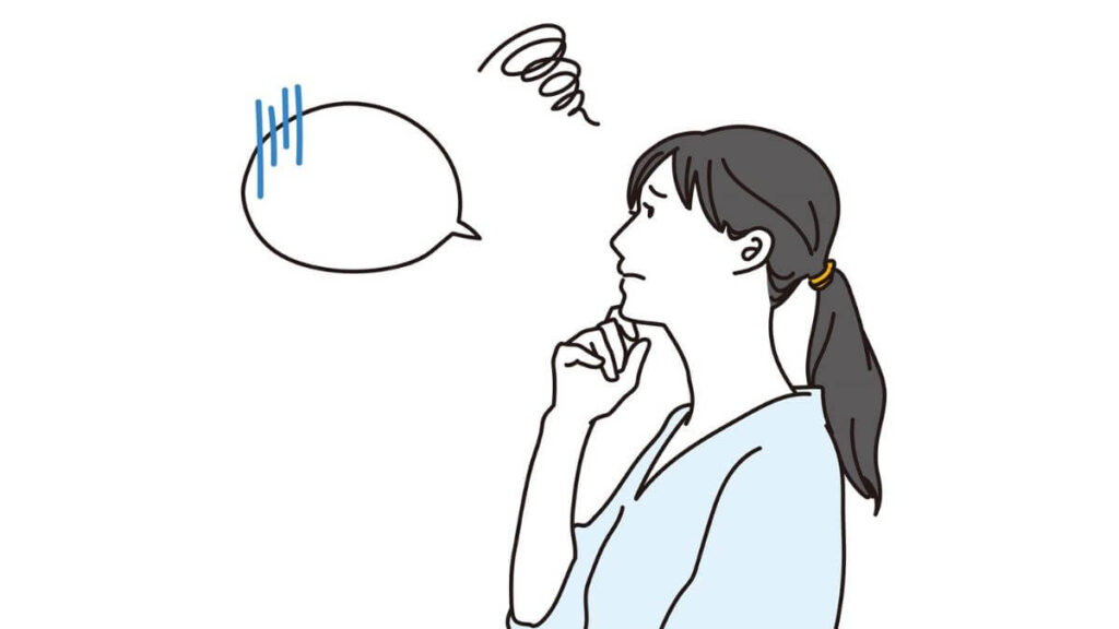 不安な表情で上を見上げる若い女性