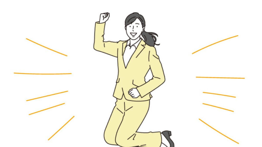 飛び上がって喜ぶスーツ姿の女性