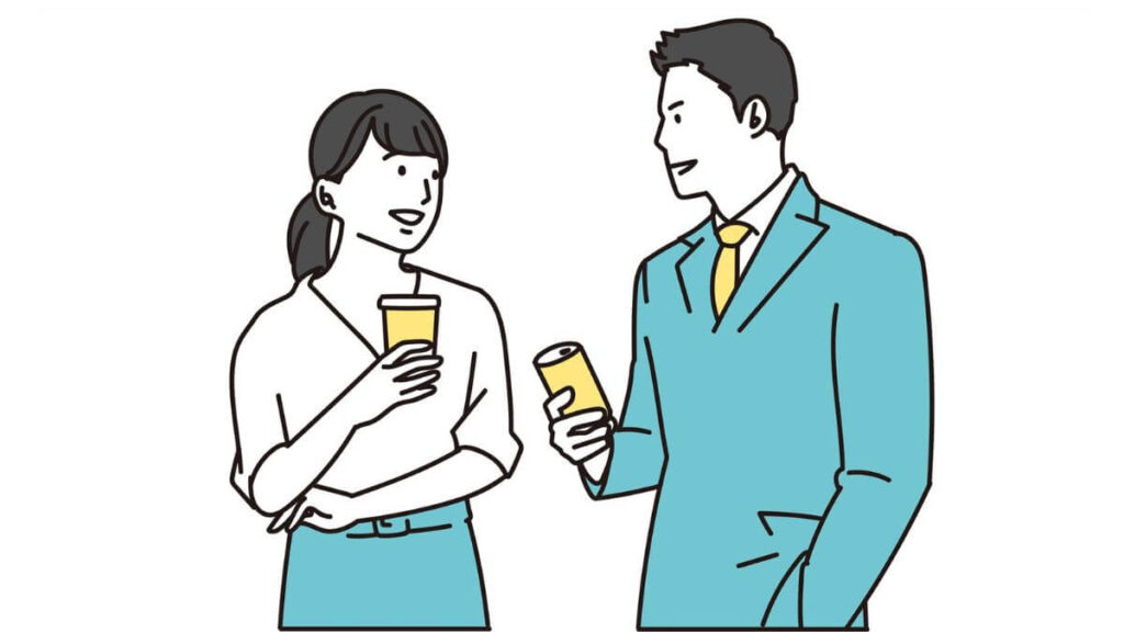 コーヒーを片手に仲良く会話をする男女
