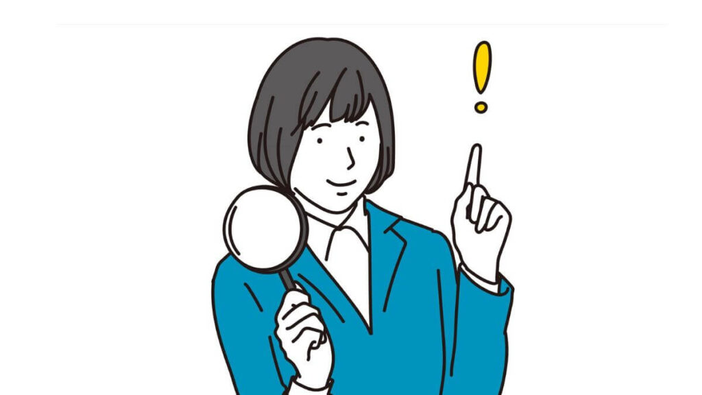 人差し指をあげて得意げな表情をする女性