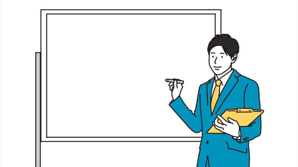 ホワイトボードを使い説明するスーツ姿の男性