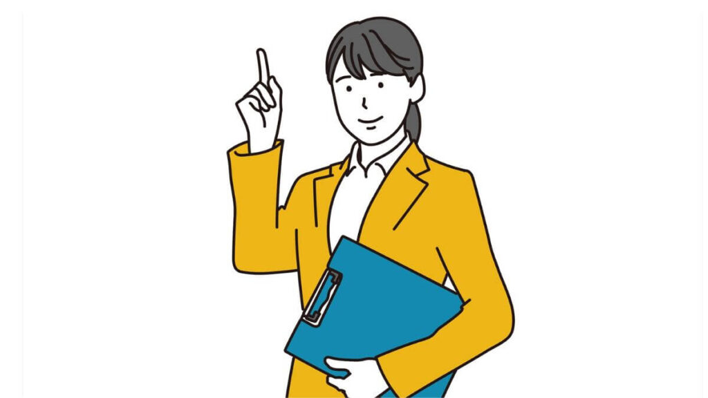 人差し指をあげて説明するスーツ姿の女性