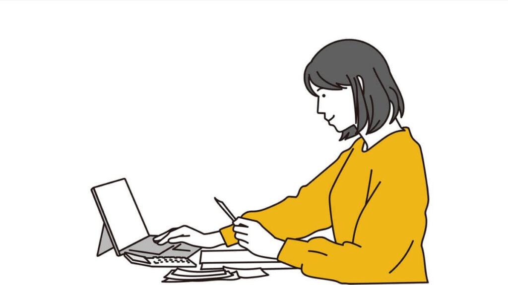 パソコンを使い仕事をする若い女性