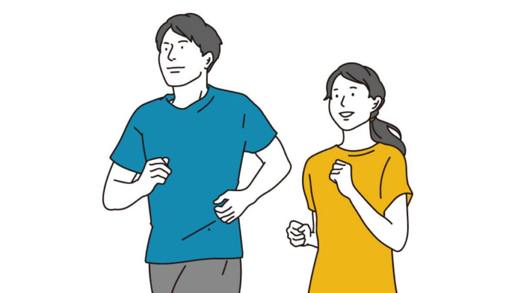 仲良くジョギングをする若い男女