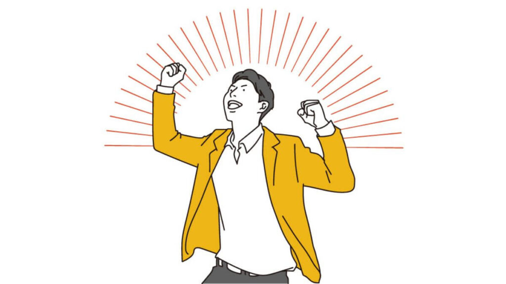 ガッツポーズをして喜ぶ若い男性