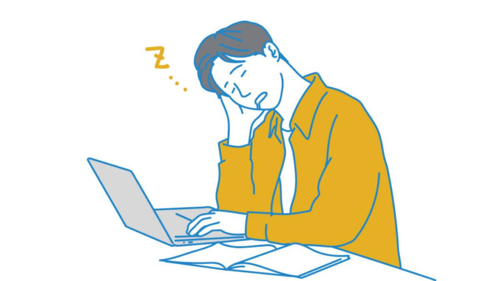 仕事中にパソコン前で寝てしまう男性