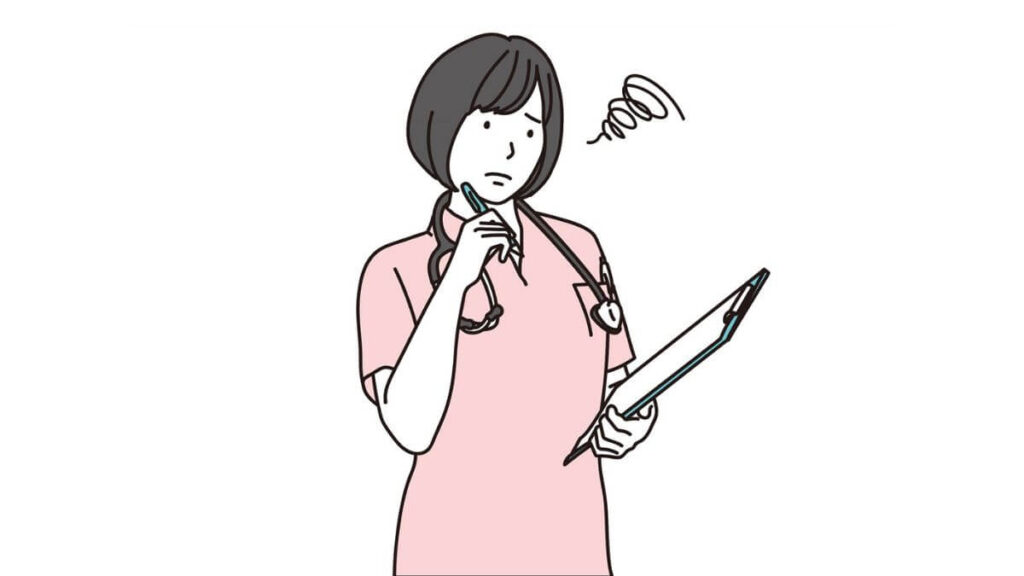 首を傾げて困った表情をする看護師の女性