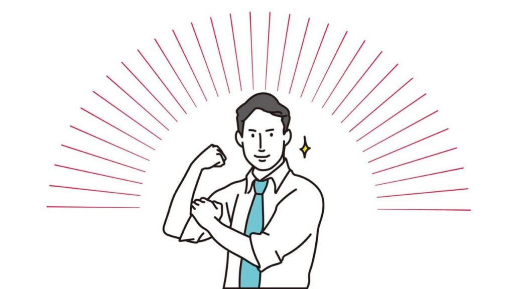 シャツの袖をまくりガッツポーズをする男性