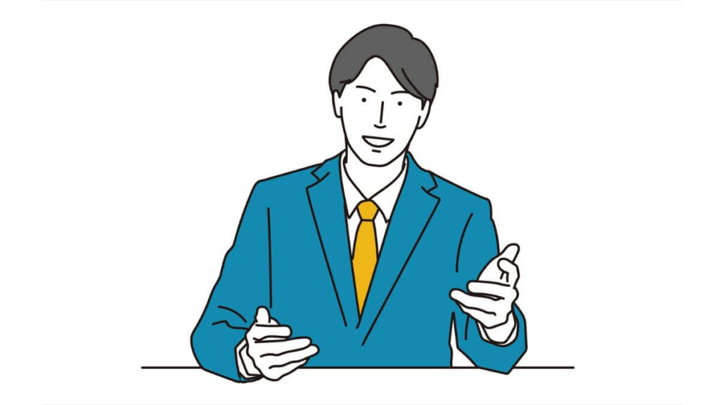 やる気のある表情で説明をするスーツ姿の男性