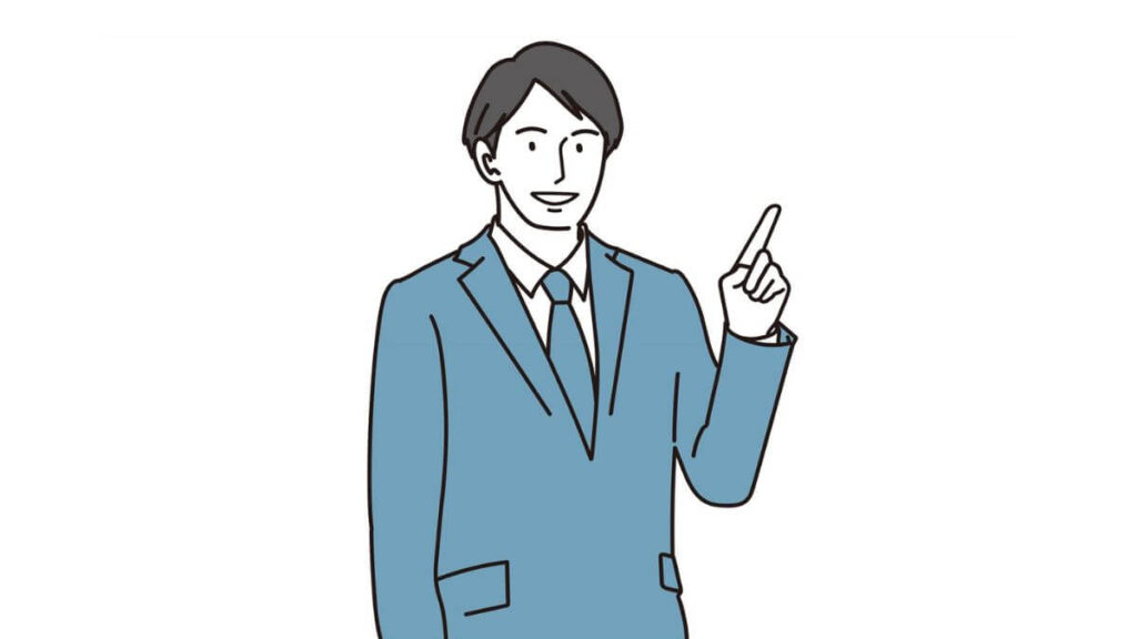 人差し指を出し説明するスーツ姿の男性