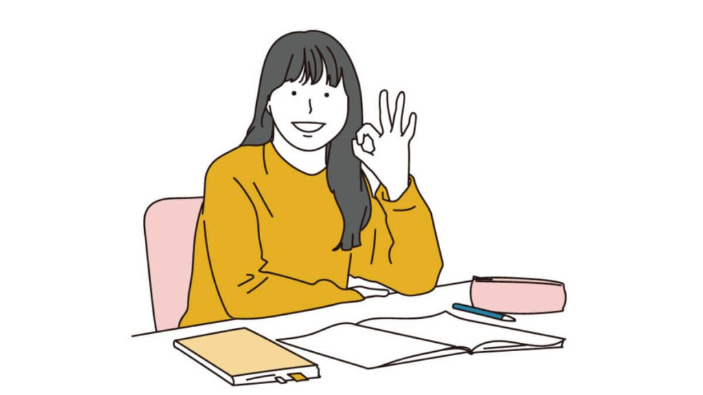 OKサインを出す笑顔の女子学生