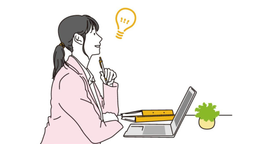 何かを閃き笑顔のキャリアウーマン