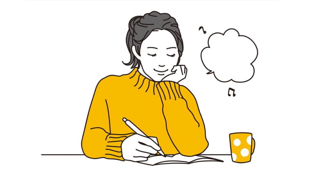 気分良さそうにメモ書きをする若い女性