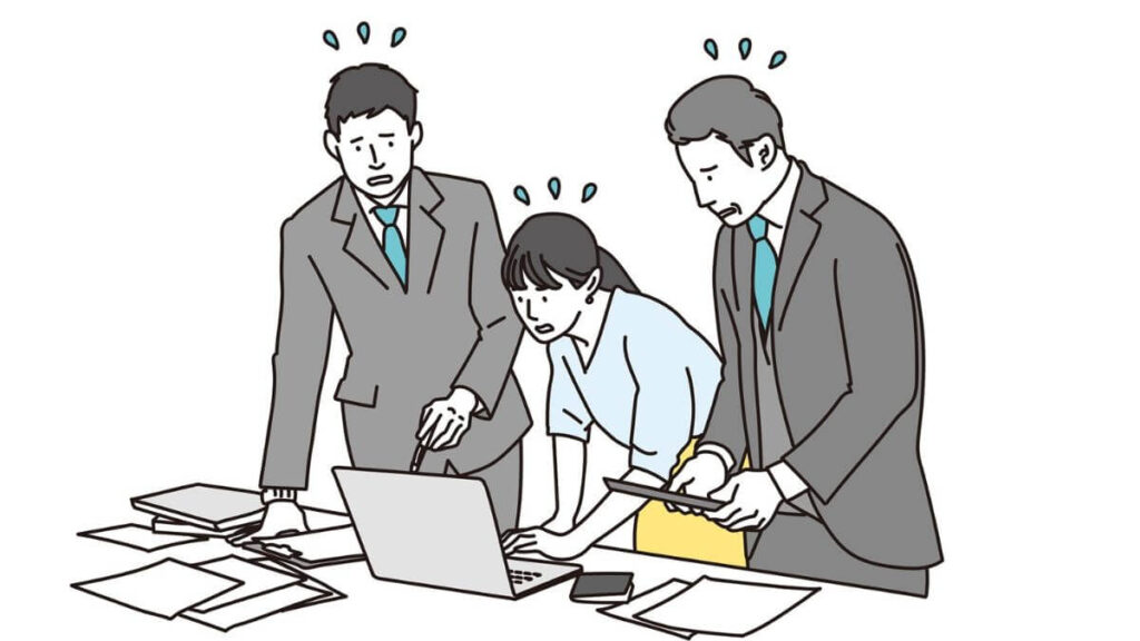 焦りがながら仕事をするサラリーマンとキャリアウーマン