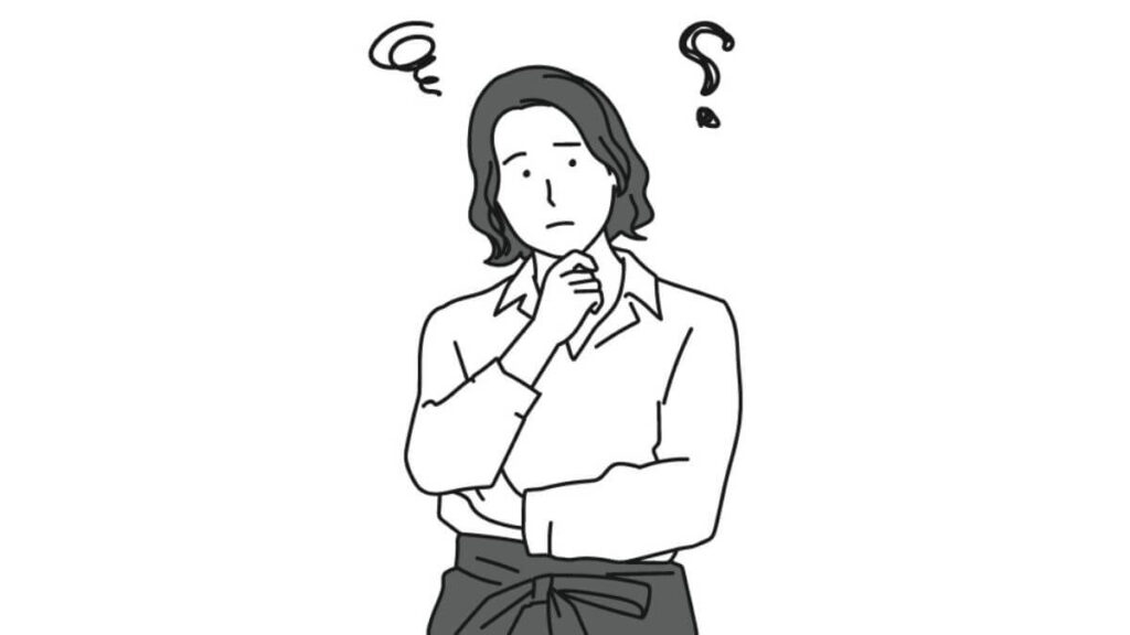 疑問を感じるウェイトレスの女性