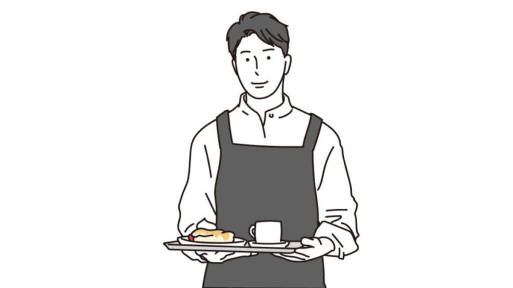コーヒーを運ぶ若い男性ウェイトレス