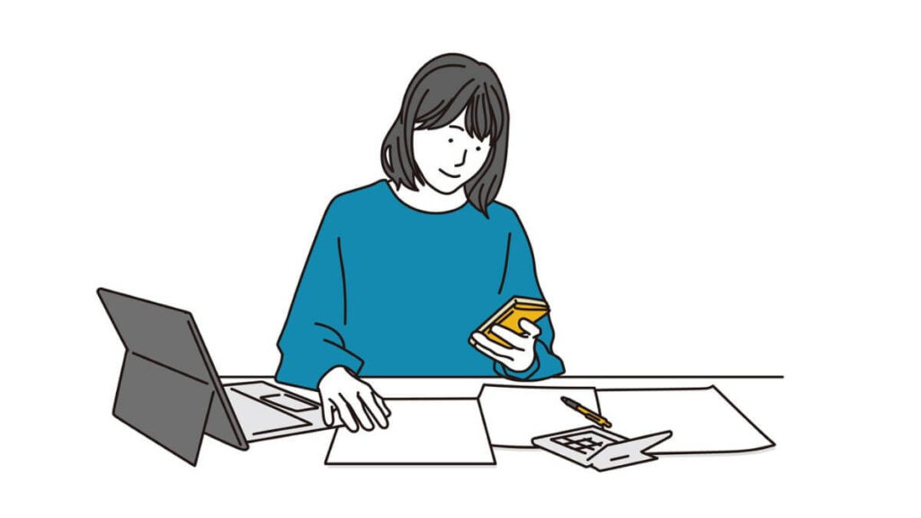 スマホを使ってメモを取る若い女性