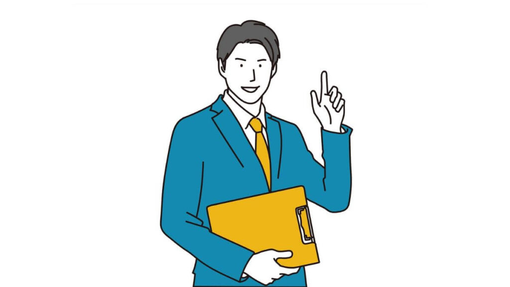 人差し指をあげて説明するサラリーマン