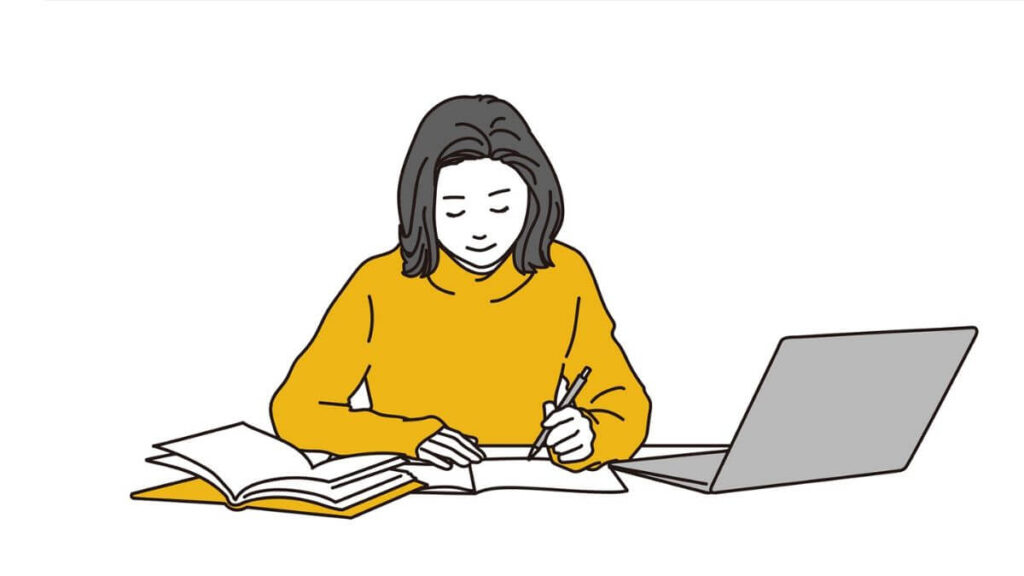 落ち着いた表情で仕事をするキャリアウーマン