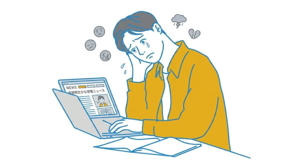 パソコンを見てつらい気持ちになる男性